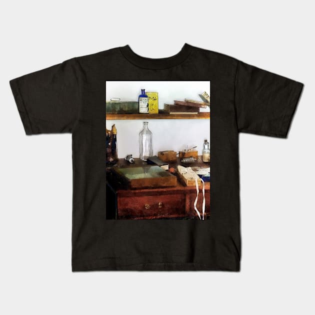 19th Century Veterinarian's Office Kids T-Shirt by SusanSavad